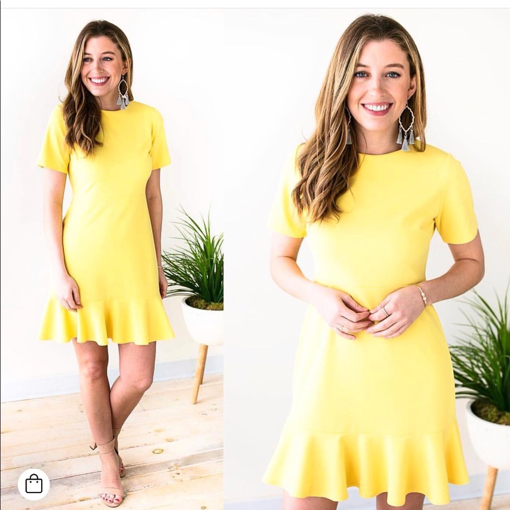 NWT boutique style dress. Yellow fit and flare